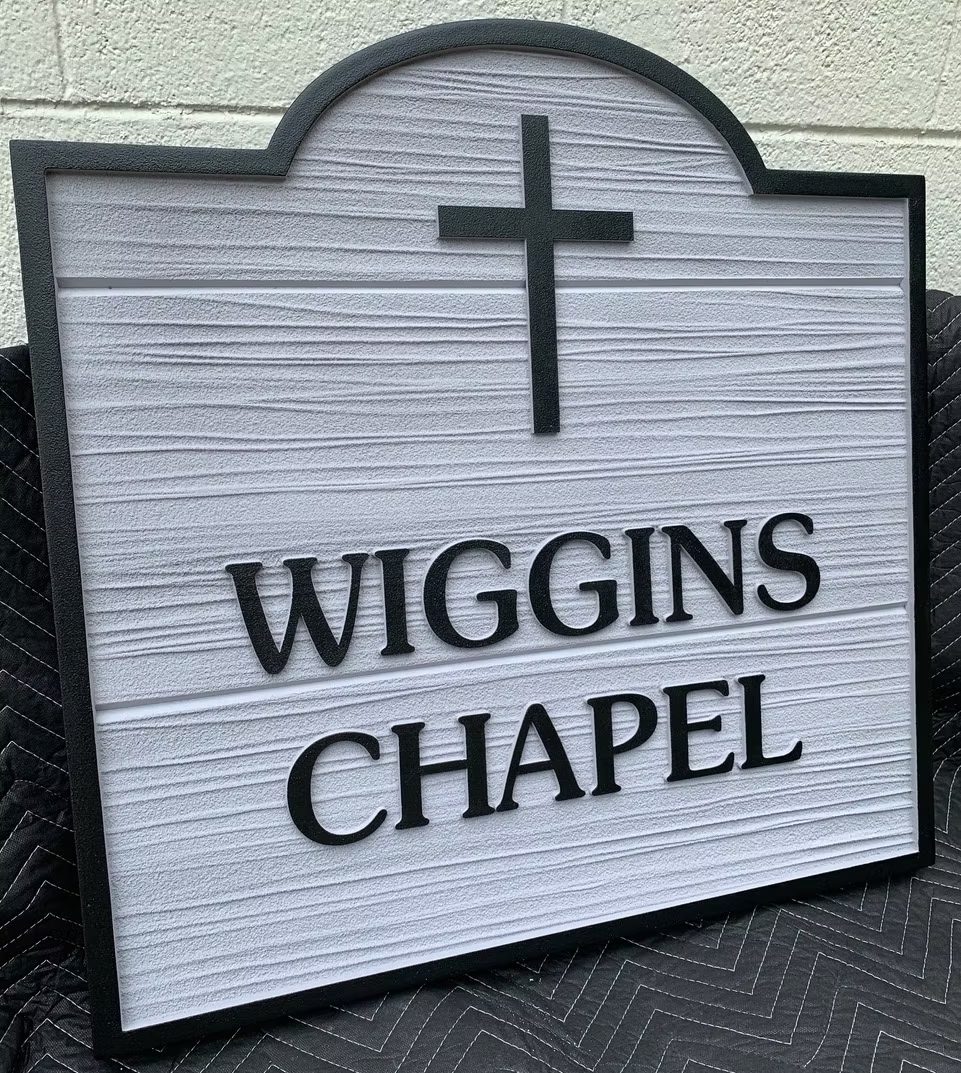 Church identification sign with architectural profile