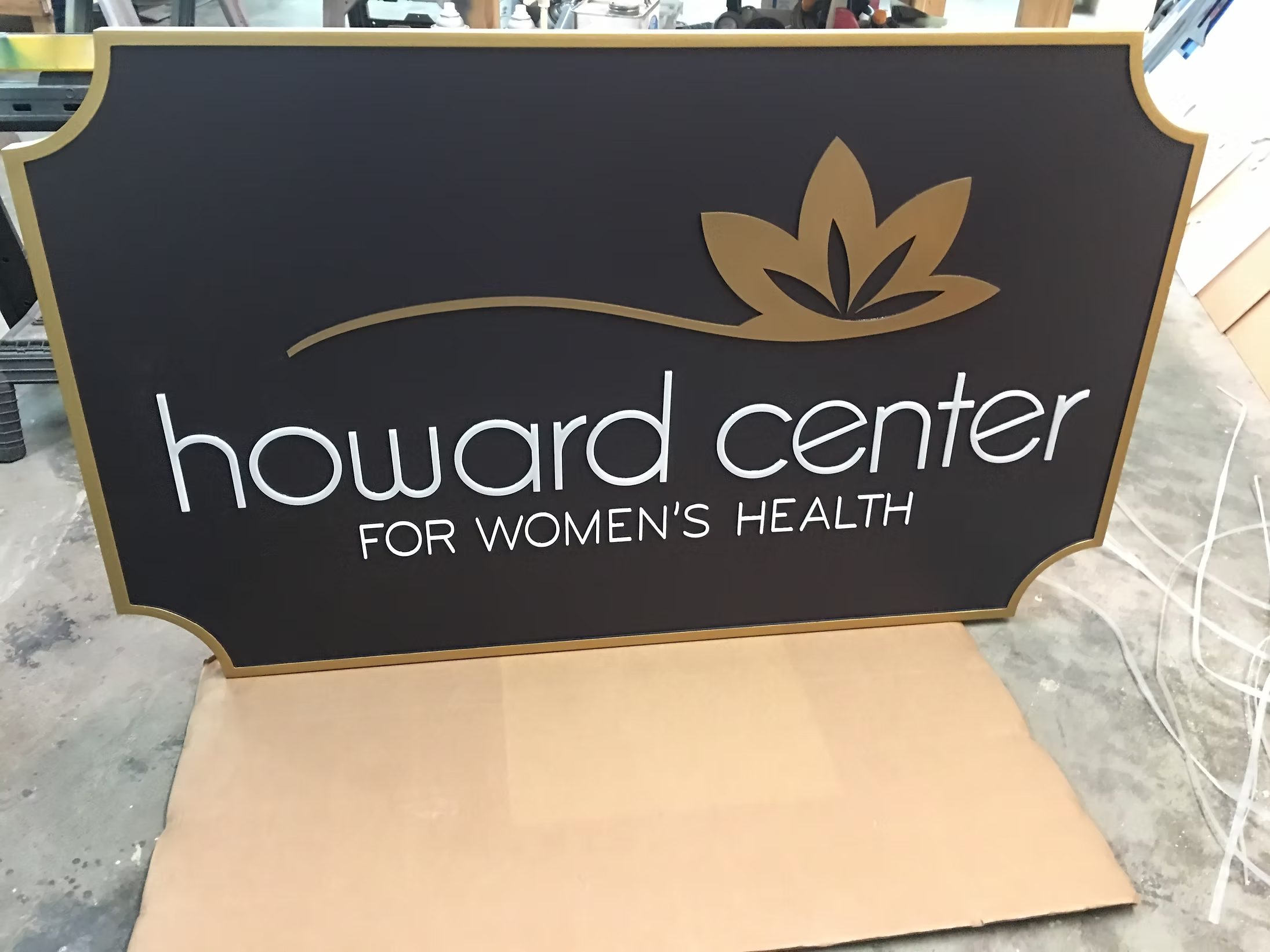 Women’s health center sign in production