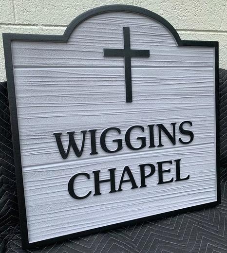 Church identification sign with architectural profile