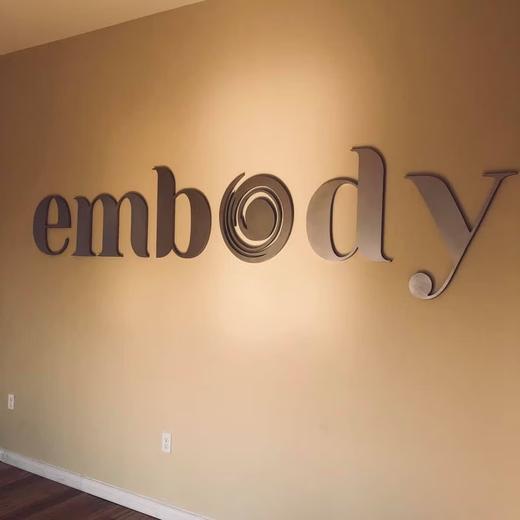 Interior dimensional wall letters for a commercial space